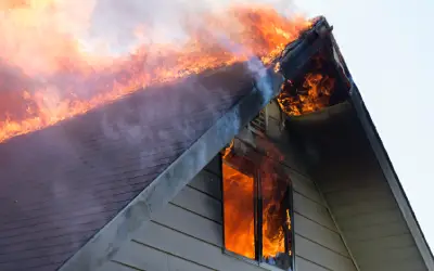 Fire and smoke leaps from a burning house in Portland OR